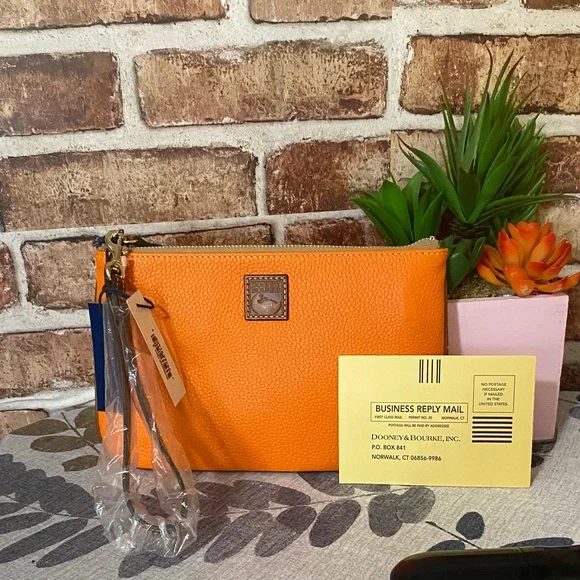 Dooney & Bourke Orange large Wristlet - Picture 1 of 4